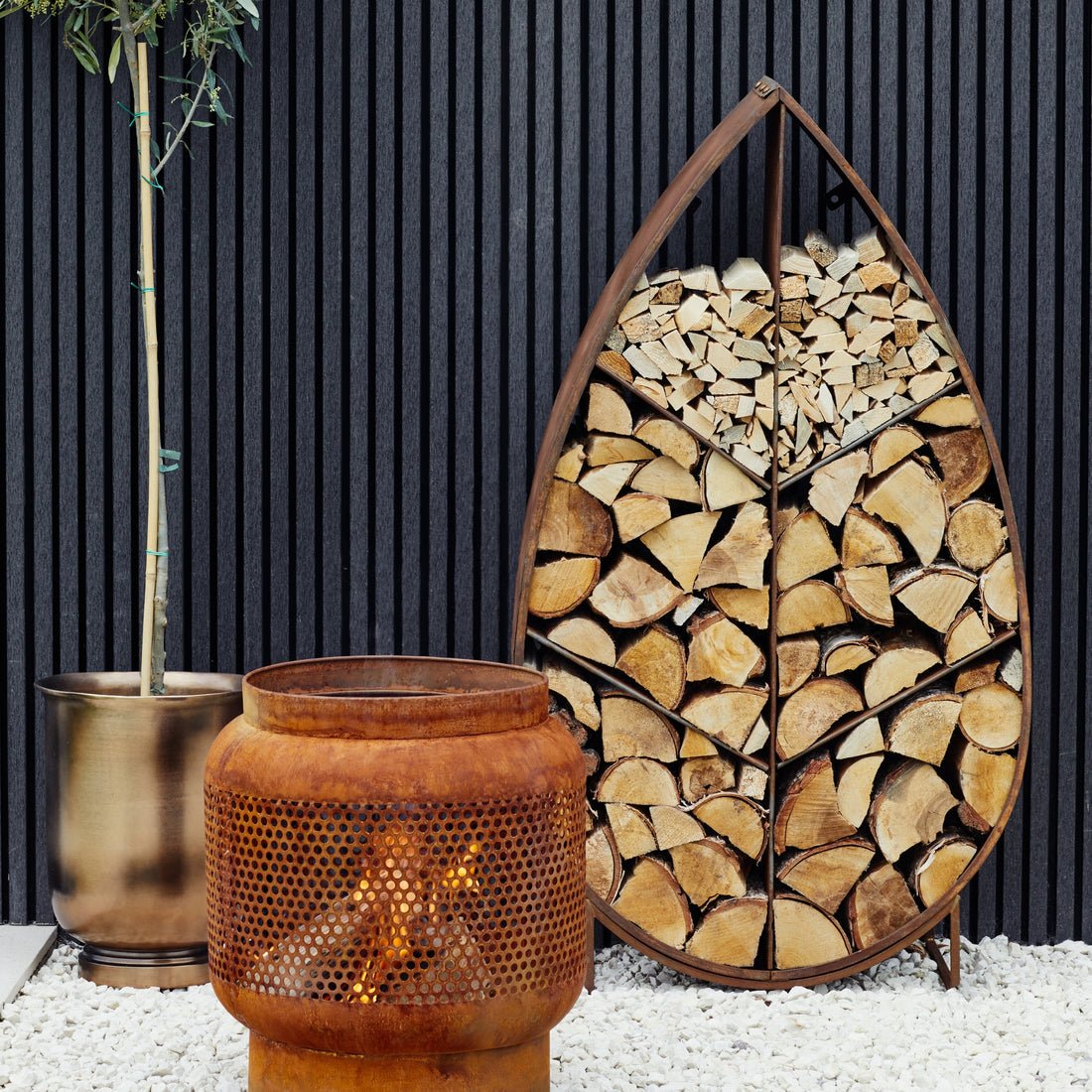 Syrin on Stand Sculptural Log Storage Natural Rust - Skandi London